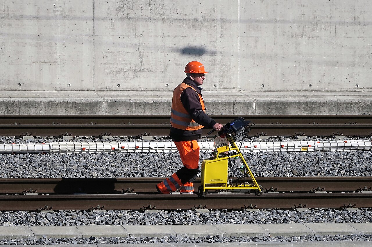 Technician performing ultrasonic testing
